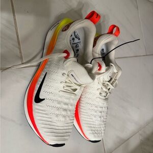 Nike React Infinity Run 4 with Neon Orange and Yellow Accents